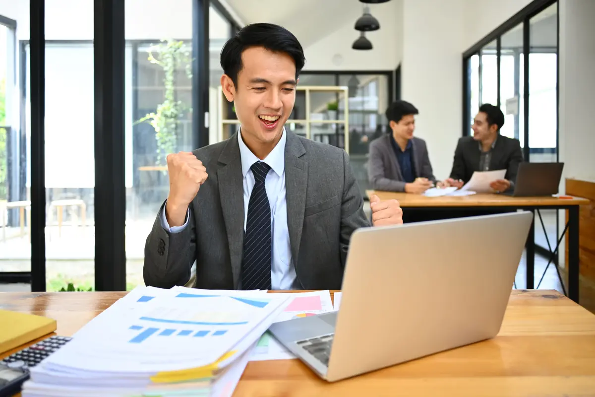 happy-male-marketing-business-manager-looking-at-l-2026-01-06-08-54-17-utc (1).jpg